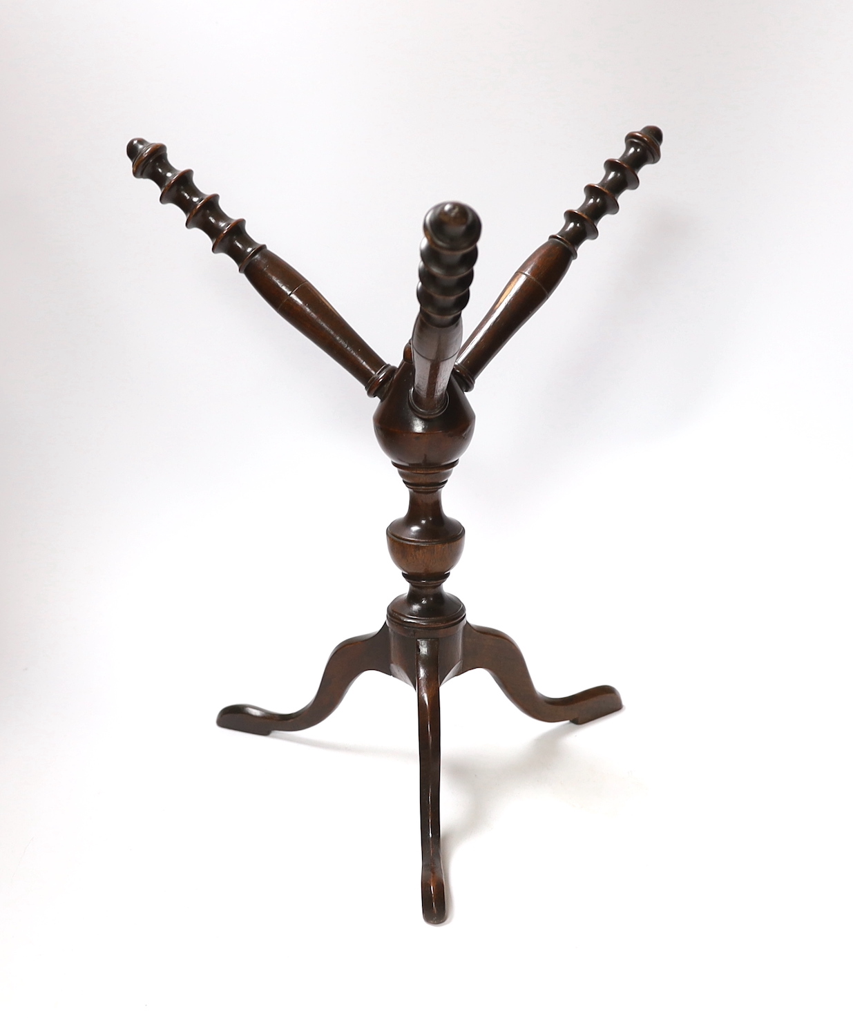 A George III turned mahogany ‘cat’ stand, 34cm